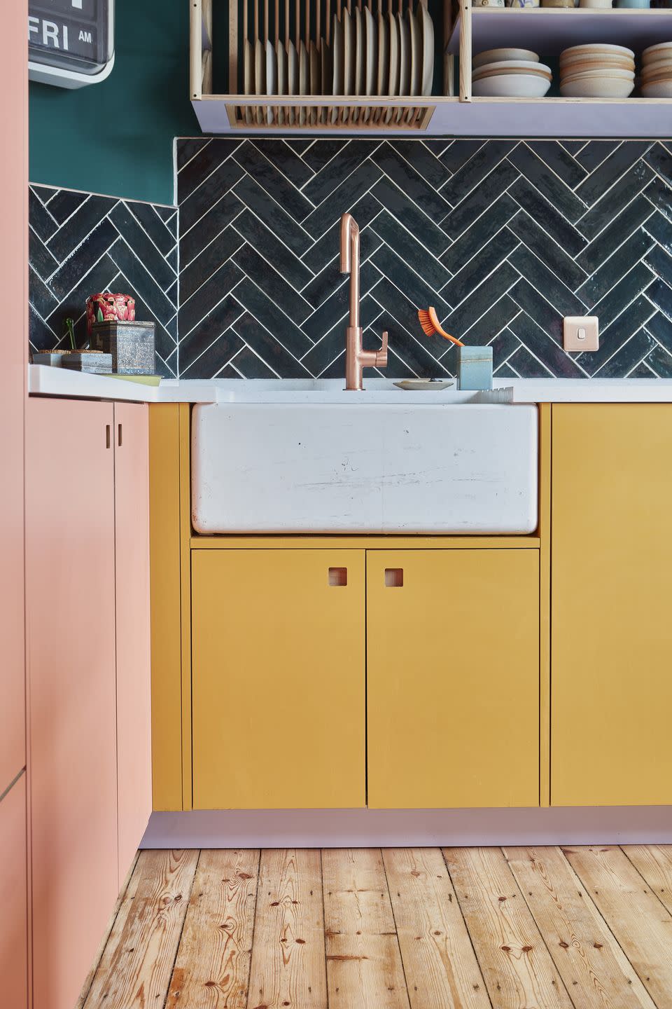 <p>Why pick just one colour for your kitchen cupboards when you can have two, three or even four? This kitchen by Pluck combines pastel shades to joyful effect – even the kickboards have been given a lick of lilac. <a href="https://www.pluck.kitchen/" rel="nofollow noopener" target="_blank" data-ylk="slk:pluck.kitchen;elm:context_link;itc:0;sec:content-canvas" class="link ">pluck.kitchen</a></p>