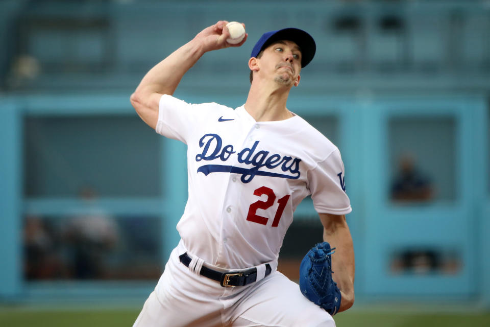 LOS ANGELES, CALIFORNIA - JULY 22: Walker Buehler #21 of the Los Angeles Dodgers pitches in the first inning against the San Francisco Giants at Dodger Stadium on July 22, 2021 in Los Angeles, California. (Photo by Katelyn Mulcahy/Getty Images)