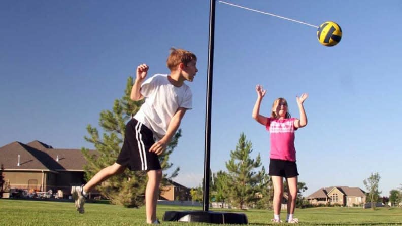 Kids will love playing tetherball in the yard with this portable system.