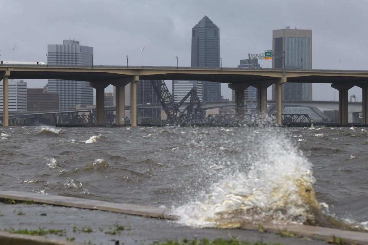 Waves splash over the seawall of Lancaster Terrace near Jacksonville's Memorial Park as the bands of wind and rain from Hurricane Debby blew through Jacksonville as the storm made landfall in Florida's Big Bend region near Steinhatchee Monday, August 5, 2024. [Bob Self/Florida Times-Union]