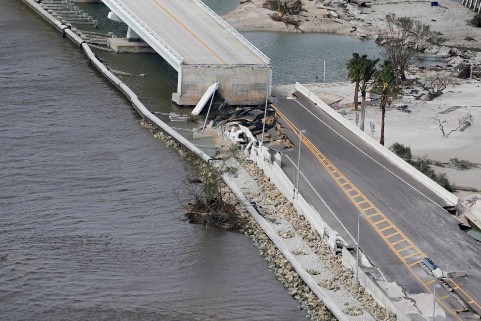 A damaged causeway to Sanibel Island is seen in the aftermath of Hurricane Ian , Thursday, Sept. 29, 2022, near Sanibel Island, Fla. (AP Photo/Wilfredo Lee)