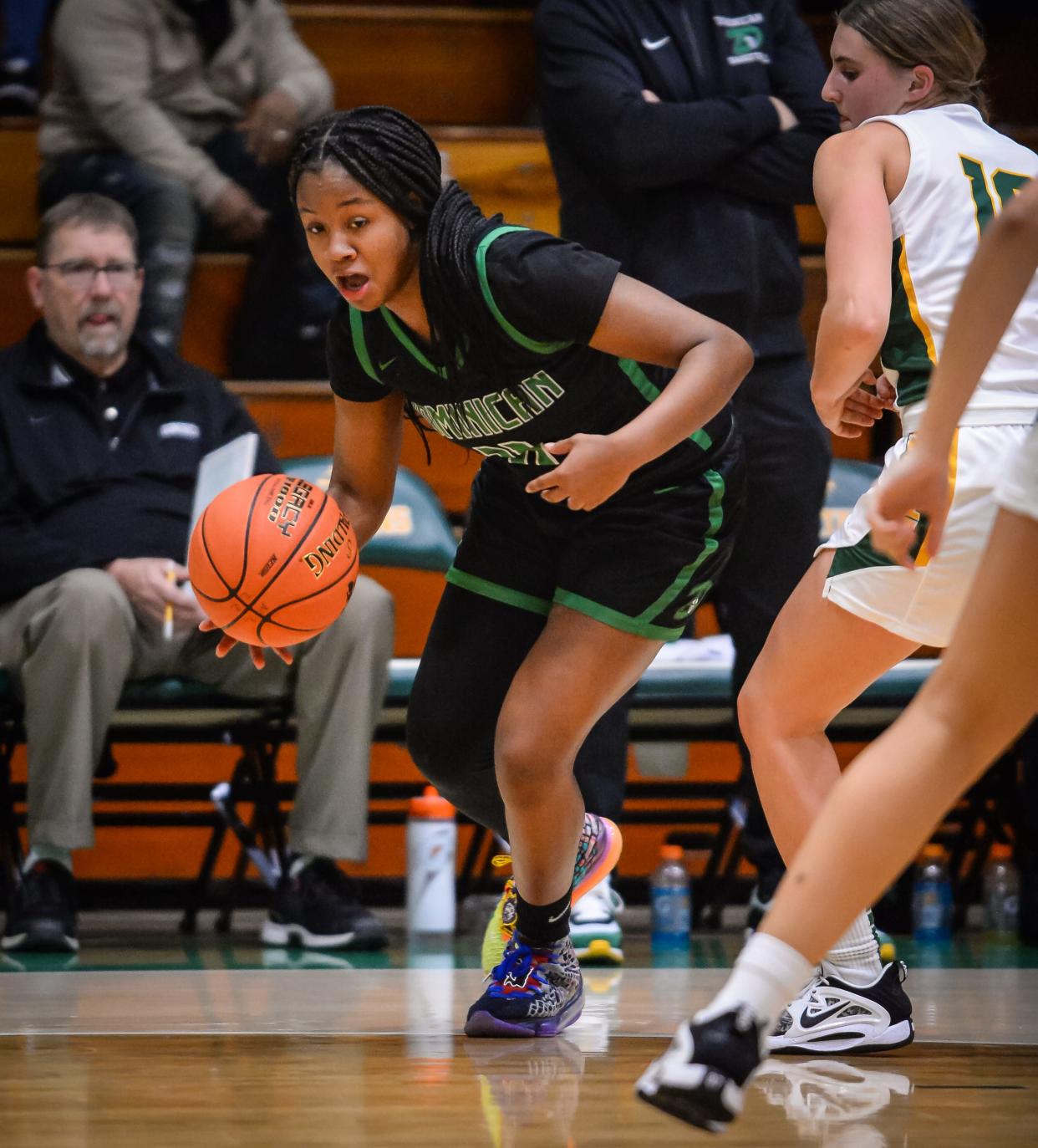 Whitefish Bay Dominican guard Keona McGee (11) averaged 14.7 points, 4.7 steals, 4.2 rebounds and 4.2 assists last season.