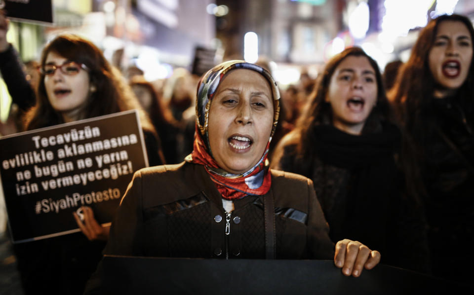 Women shout slogans and hold signs during a demonstration against a proposed bill in Istanbul on Nov. 22, 2016.&nbsp;