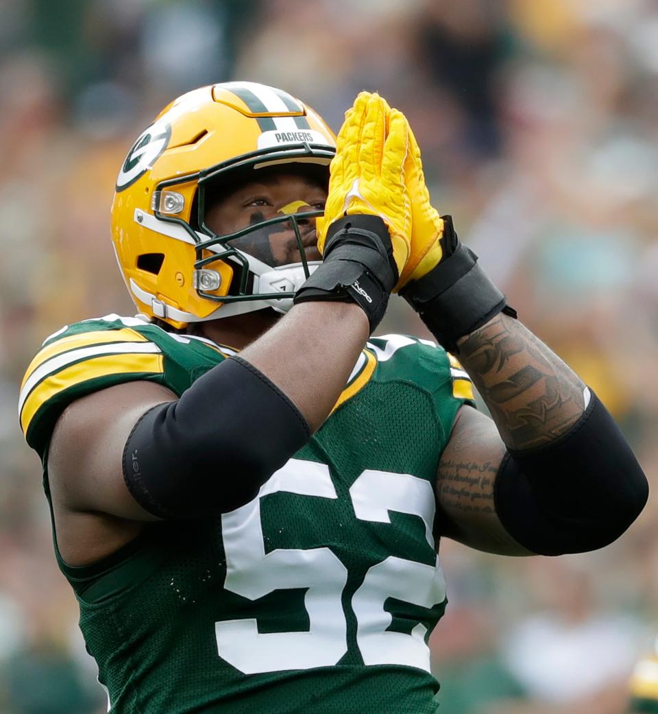 Green Bay Packers linebacker Rashan Gary (52) reacts after a sack against the New Orleans Saints during their football game Sunday, September 24, 2023, at Lambeau Field in Green Bay, Wis.