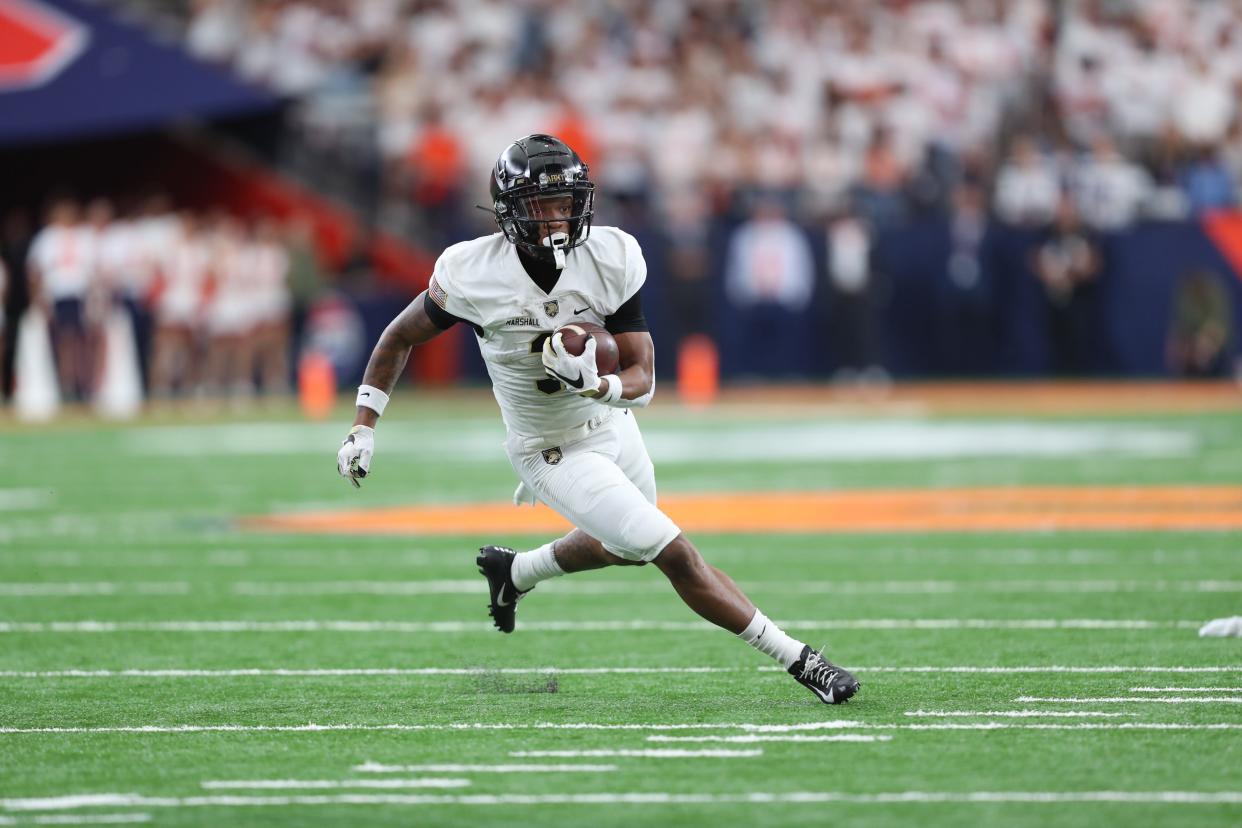 Ay'Jaun Marshall played against numerous Power Five opponents during his Army career. Here he runs the ball in a loss to Syracuse this season.