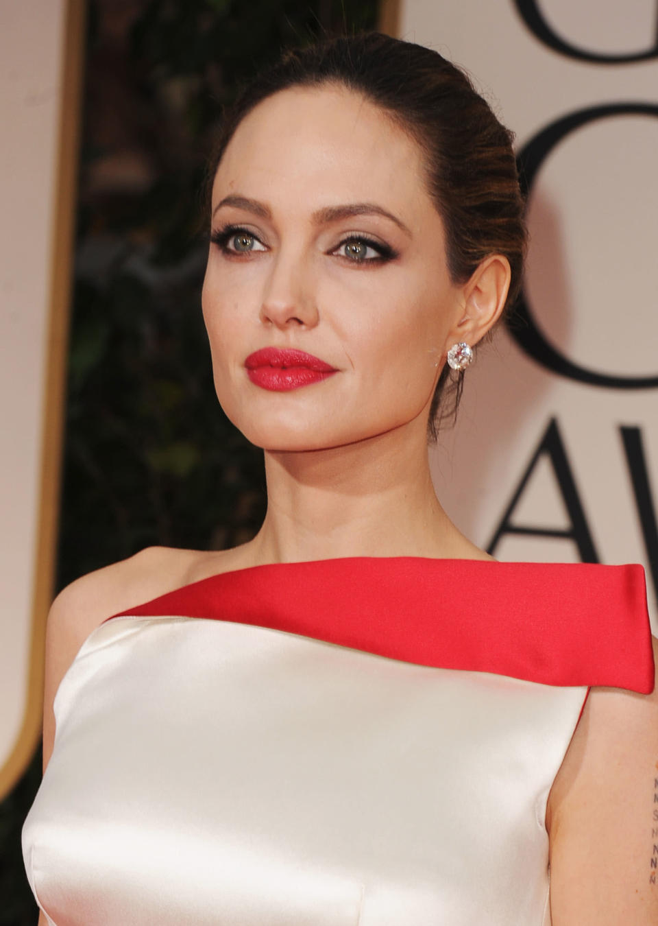 HIT: Love her or hate her, Angelina is pure perfection. My only question is why doesn’t she wear a red lip every single day?! So. Gorgeous. And her skin is FLAWLESS. (Steve Granitz/WireImage)