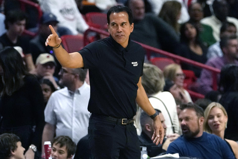 Miami Heat coach Erik Spoelstra gestures during the first half of the team's NBA basketball game against the Atlanta Hawks, Friday, Dec. 22, 2023, in Miami. (AP Photo/Lynne Sladky)