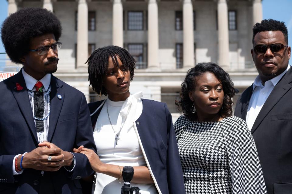 Democratic State Representative Justin Pearson stands with his fiancée and parents outside of the Tennessee State Capitol building after being sworn in on April 13, 2023, in Nashville, Tennessee. (Photo by Seth Herald/Getty Images)