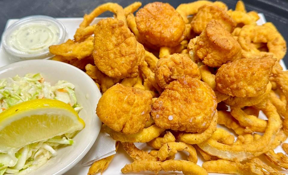 One of Doyle’s specialties is the fried scallop plate served with your choice of side, coleslaw and tartar sauce.