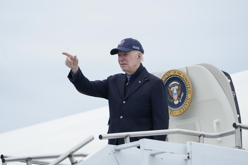 President Joe Biden gestures boarding Air Force One at Nantucket Memorial Airport in Nantucket, Mass., Sunday, Nov. 27, 2022. Biden is heading back to Washington after spending the Thanksgiving Day holiday in Nantucket with family. (AP Photo/Susan Walsh)