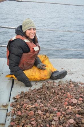 The author, Amanda Netburn, buried in sea urchins.