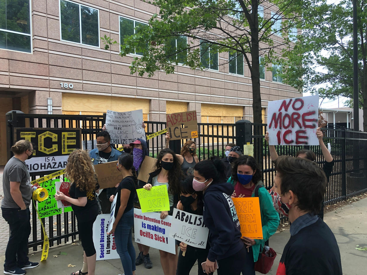 Protesters gather at a news conference in Atlanta, decrying conditions at Irwin County Detention Center in Ocilla, Ga., Sept. 15, 2020.