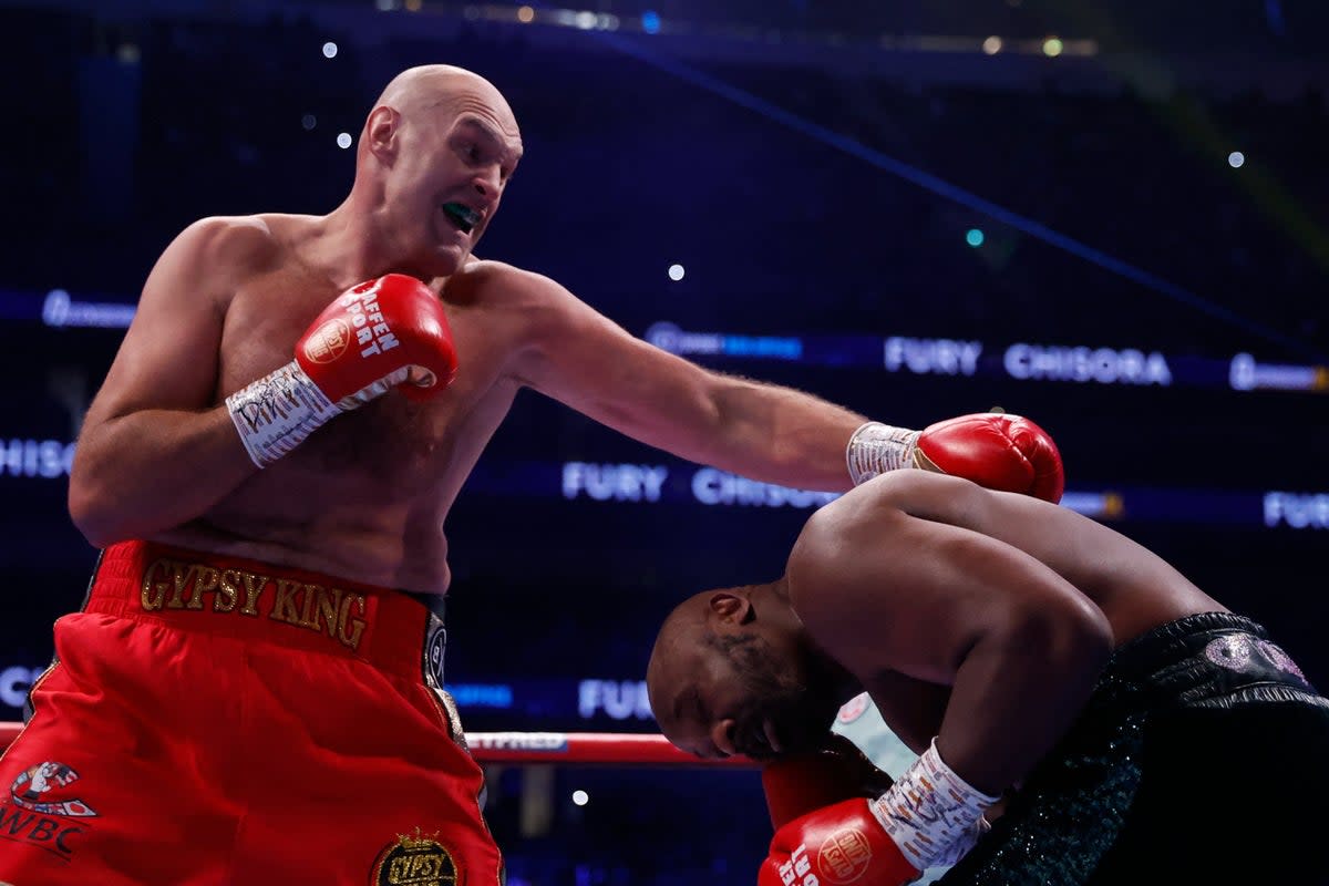 Dominance: Tyson Fury made it a hat-trick of wins over Derek Chisora to retain his WBC heavyweight title  (Action Images via Reuters)