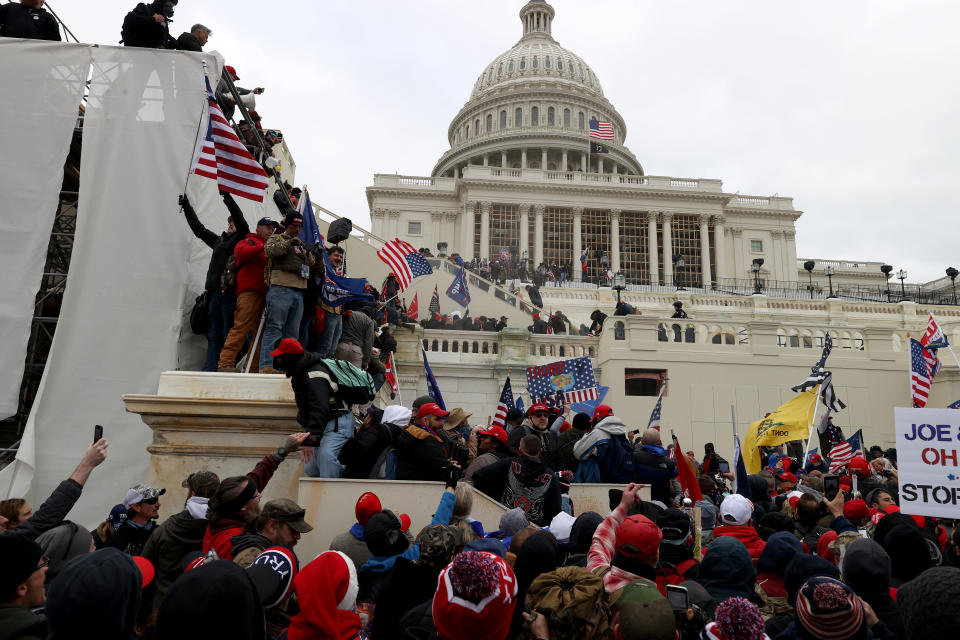 WASHINGTON, DC - JANUARY 06: Protesters gather outside the U.S. Capitol Building on January 06, 2021 in Washington, DC. Pro-Trump protesters entered the U.S. Capitol building after mass demonstrations in the nation's capital during a joint session Congress to ratify President-elect Joe Biden's 306-232 Electoral College win over President Donald Trump. (Photo by Tasos Katopodis/Getty Images)