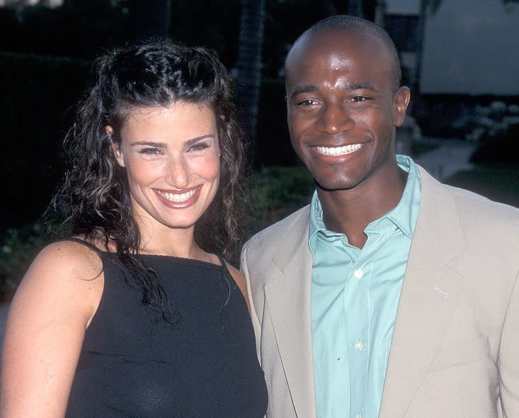 Close-up of Idina and Taye smiling