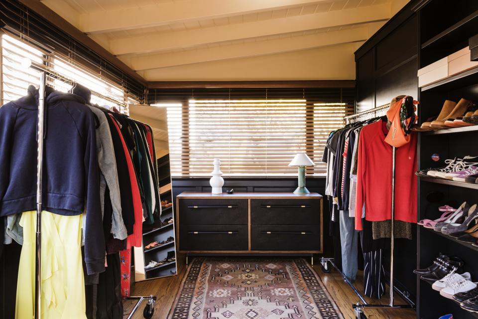 Lucia’s dressing room, formerly a sunroom, was enclosed after the house was built. The copper lamp is by <a rel="nofollow noopener" href="https://www.giancarlovalle.com/items/ron-rezek-copper-lamp" target="_blank" data-ylk="slk:Ron Rezek;elm:context_link;itc:0;sec:content-canvas" class="link ">Ron Rezek</a>.