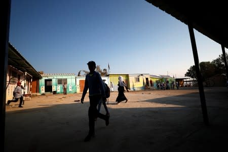 Palestinian students arrive at their school in Jordan Valley in the Israeli-occupied West Bank