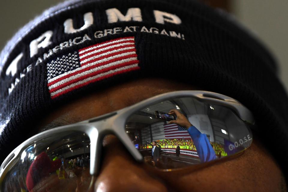 A man listens as President Donald Trump speaks at Shell's Pennsylvania Petrochemicals Complex on Aug. 13, 2019, in Monaca, Pa.