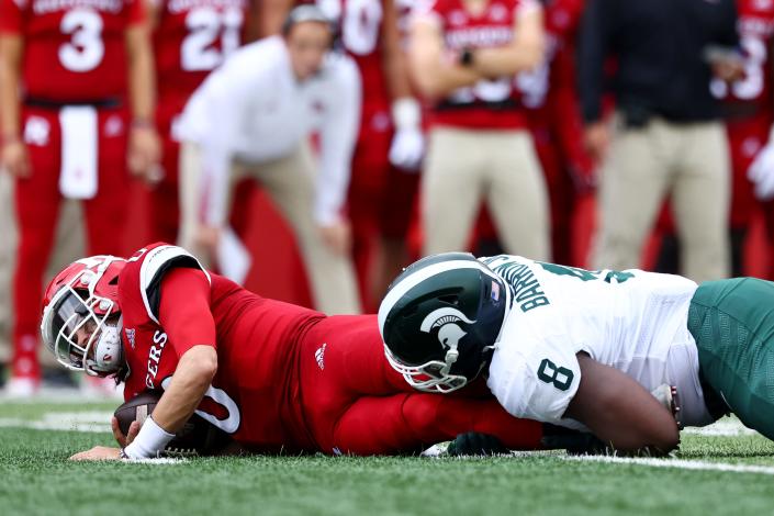 Rutgers quarterback Noah Vedral is sacked by Michigan State&#39;s Simeon Barrow during the first quarter at SHI Stadium on Oct. 9, 2021 in Piscataway, N.J.