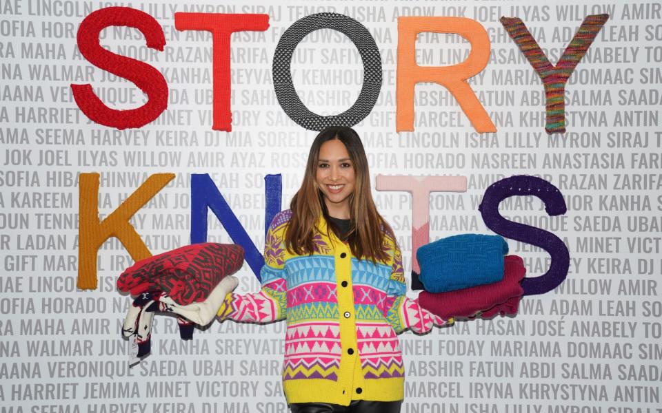 Save the Children ambassador Myleene Klass during a visit to Story Knits, a second-hand jumper pop-up store in Covent Garden