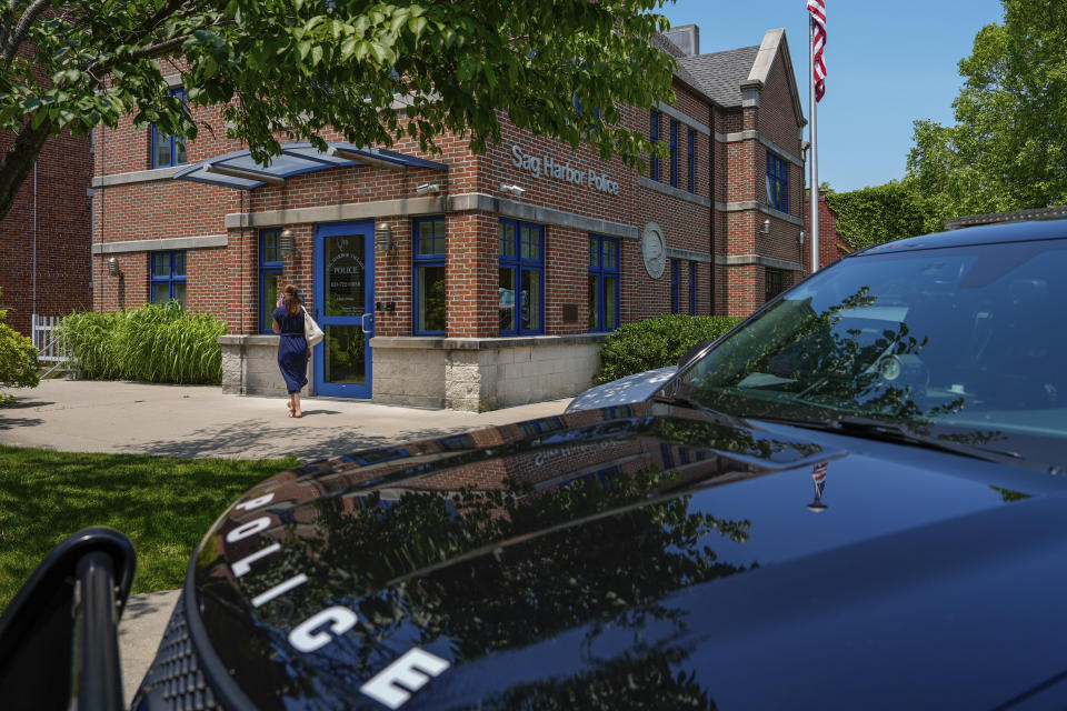 A squad car sits parked outside the Sag Harbor Police Headquarters, Tuesday, June 18, 2024, in Sag Harbor, N.Y. Pop star Justin Timberlake was charged early Tuesday with driving while intoxicated in Sag Harbor after police said he ran a stop sign and veered out of his lane in the posh seaside summer retreat. (AP Photo/Julia Nikhinson)