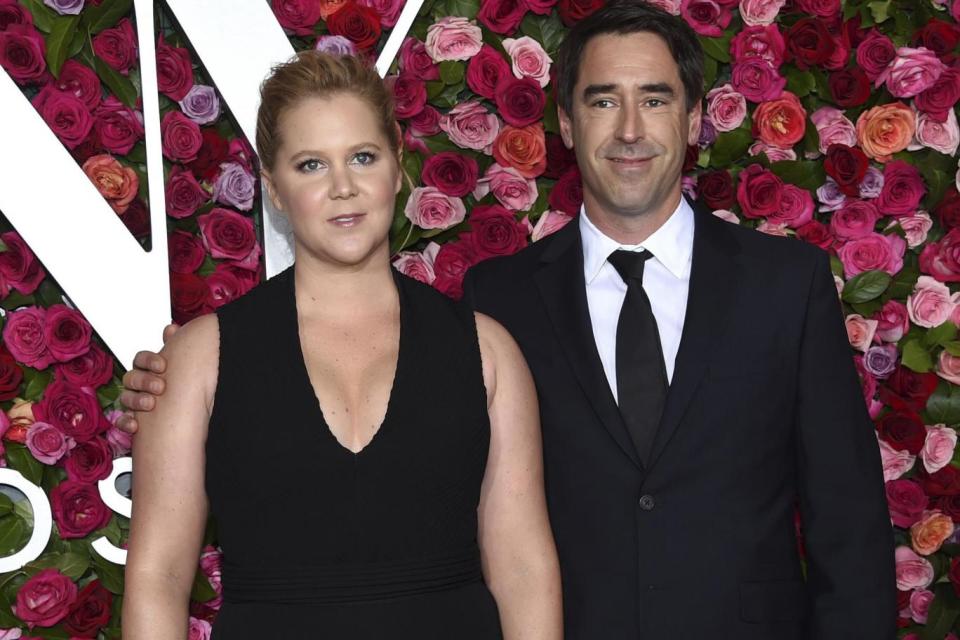 Amy Schumer with her husband Chris Fischer (Evan Agostini/Invision/AP)