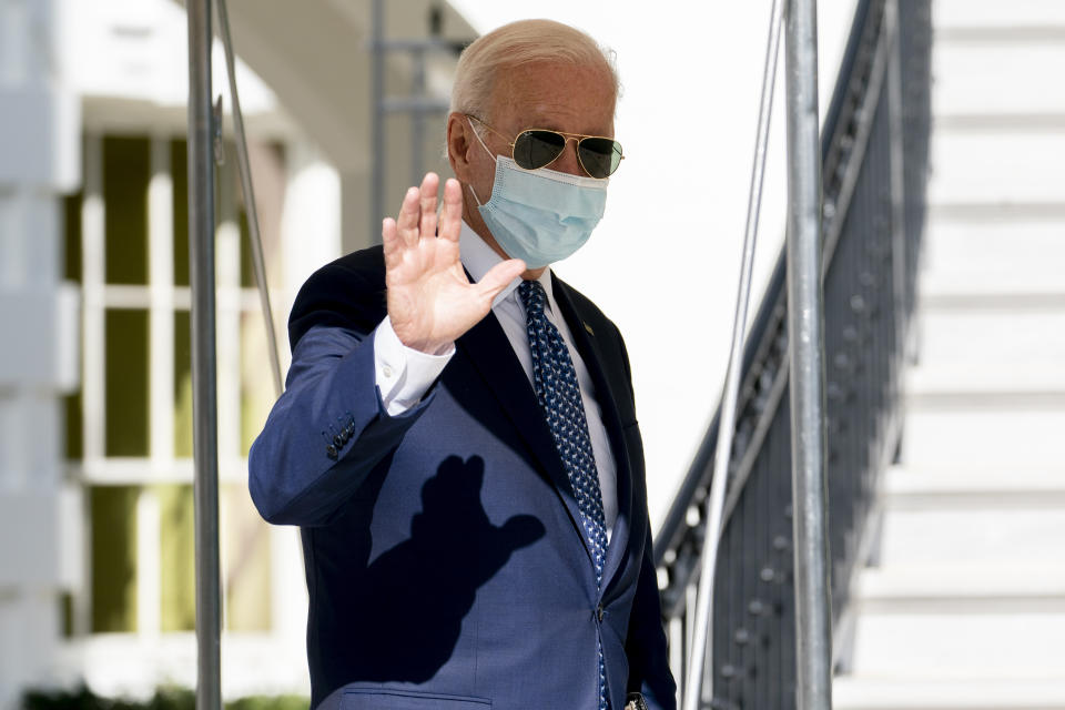 President Joe Biden waves as he walks towards Marine One on the South Lawn of the White House in Washington, Monday, Sept. 20, 2021, for a short trip to Andrews Air Force Base, Md., and then on to New York ahead of a United Nations General Assembly meeting. (AP Photo/Andrew Harnik)