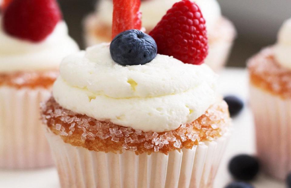 <p>Not only is this recipe patriotic in color, but it also tastes like heaven. Have your kids line the muffin tin while you mix the cake ingredients together. And, if you happen to be out of the necessary ingredients, check out these <a href="https://www.thedailymeal.com/ingredients-you-can-substitute-when-baking-or-cooking?referrer=yahoo&category=beauty_food&include_utm=1&utm_medium=referral&utm_source=yahoo&utm_campaign=feed" rel="nofollow noopener" target="_blank" data-ylk="slk:cooking and baking substitutions you should know about;elm:context_link;itc:0;sec:content-canvas" class="link ">cooking and baking substitutions you should know about</a>.</p> <p><a href="https://www.thedailymeal.com/recipes/berries-cloud-cupcakes-recipe?referrer=yahoo&category=beauty_food&include_utm=1&utm_medium=referral&utm_source=yahoo&utm_campaign=feed" rel="nofollow noopener" target="_blank" data-ylk="slk:For the Berries on a Cloud Cupcakes recipe, click here;elm:context_link;itc:0;sec:content-canvas" class="link ">For the Berries on a Cloud Cupcakes recipe, click here</a>.</p>