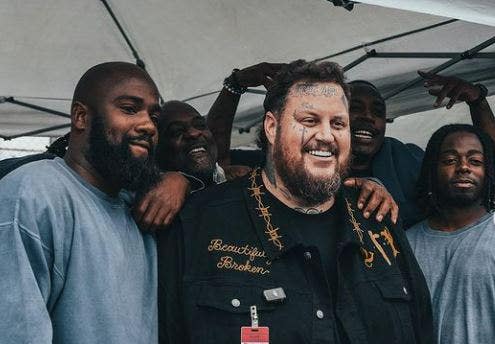 Jelly Roll posing with inmates