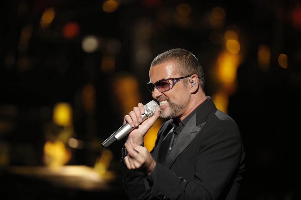 British singer George Michael performs at a concert to raise money for AIDS charity Sidaction, during the Symphonica tour at Palais Garnier Opera house in Paris, France, Sunday, Sept. 9, 2012. (AP Photo/Francois Mori)