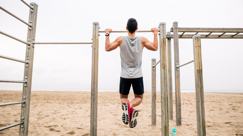 A man performing a pull-up