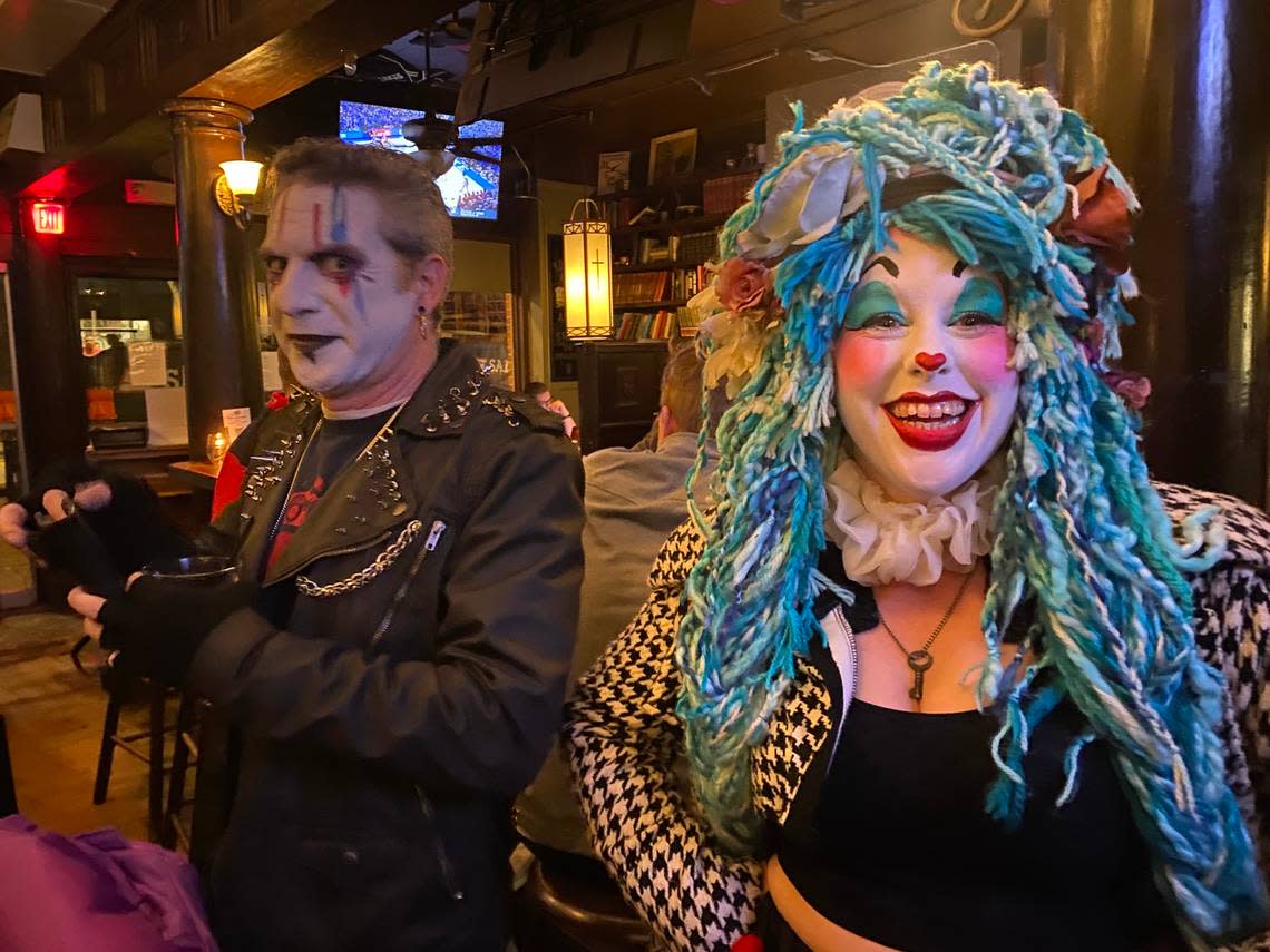 Erik Yowell and Sara Bloo kick off the first Triangle Honks Clown Crawl at Bull McCabe’s in Durham, because “the world is in dire need of your silly honking about.”