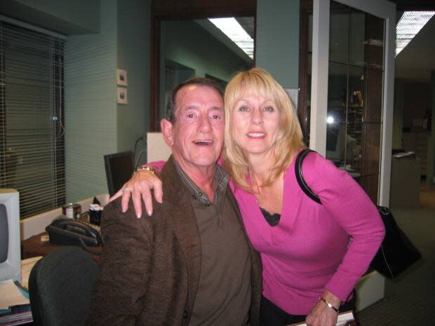 Michele Neill, right, co-owner of Kelowna's Mosaic Books store where Jack Whyte, left, hosted several book launches, remembers the writer for his exhaustive research on his novels.