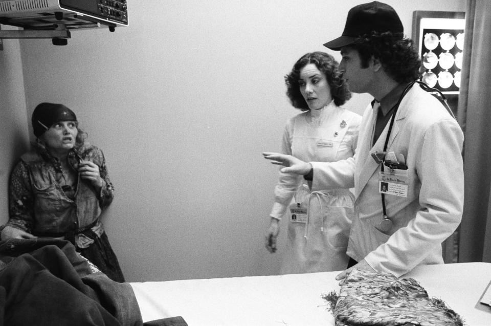 three actors during a scene from st elsewhere tv show