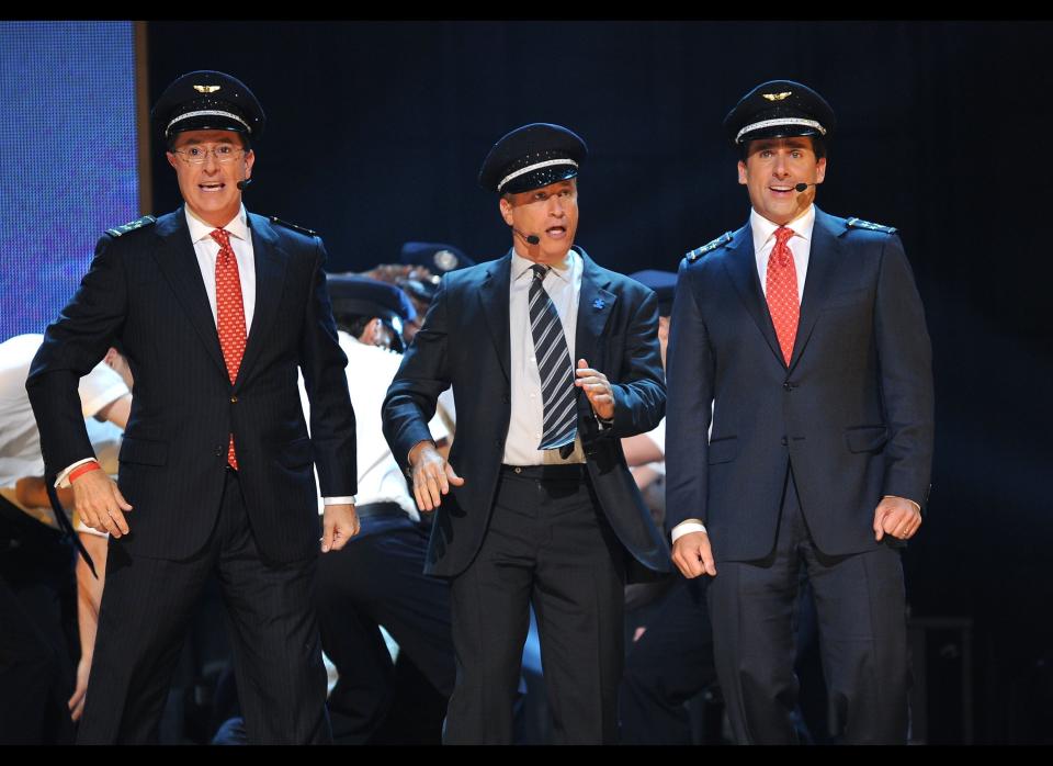 (From left to right) Stephen Colbert, Jon Stewart and Steve Carell perform onstage at Comedy Central's "Night Of Too Many Stars: An Overbooked Concert For Autism Education" in 2010.