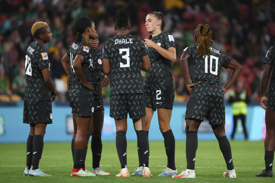 Nigeria's Ashleigh Plumptre , second from right, walk off from field during the Women's World Cup Group B soccer match between Ireland and Nigeria in Brisbane, Australia, Monday, July 31, 2023. (AP Photo/Tertius Pickard)