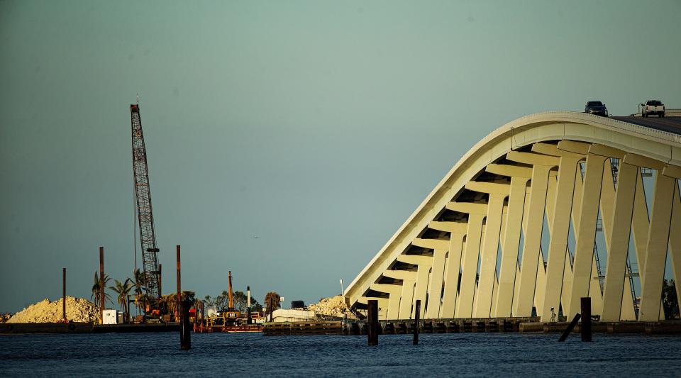 Work continues on the Sanibel Causeway on Thursday, Jan. 19, 2023. The chain of spoil islands that connects Fort Myers to Sanibel and Captiva was damaged in Hurricane Ian.  