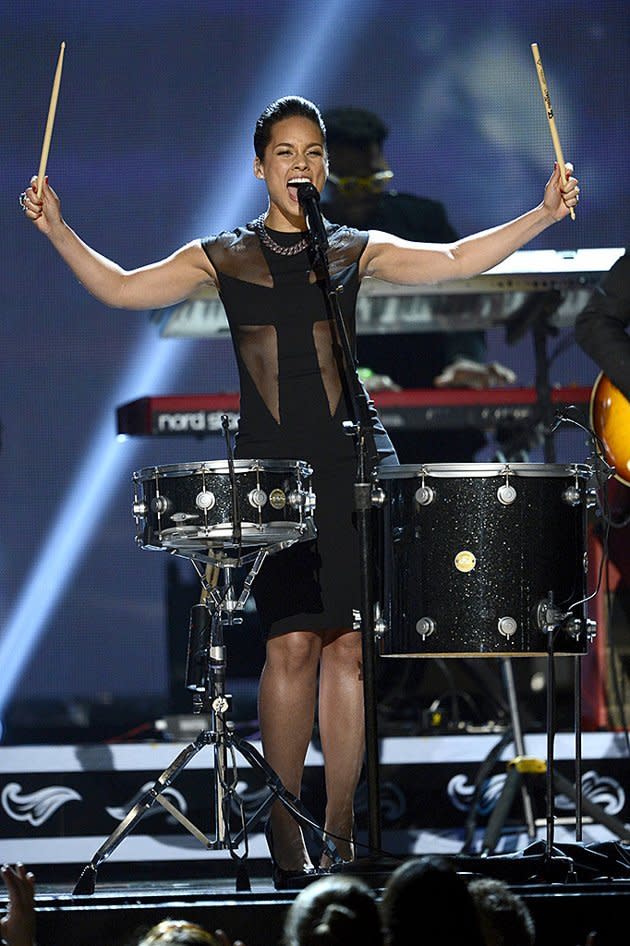 <p>Who knew Alicia Keys could also kill it on the drums? She beat her own drum during "Girl On Fire" with Maroon 5's Adam Levine.</p>