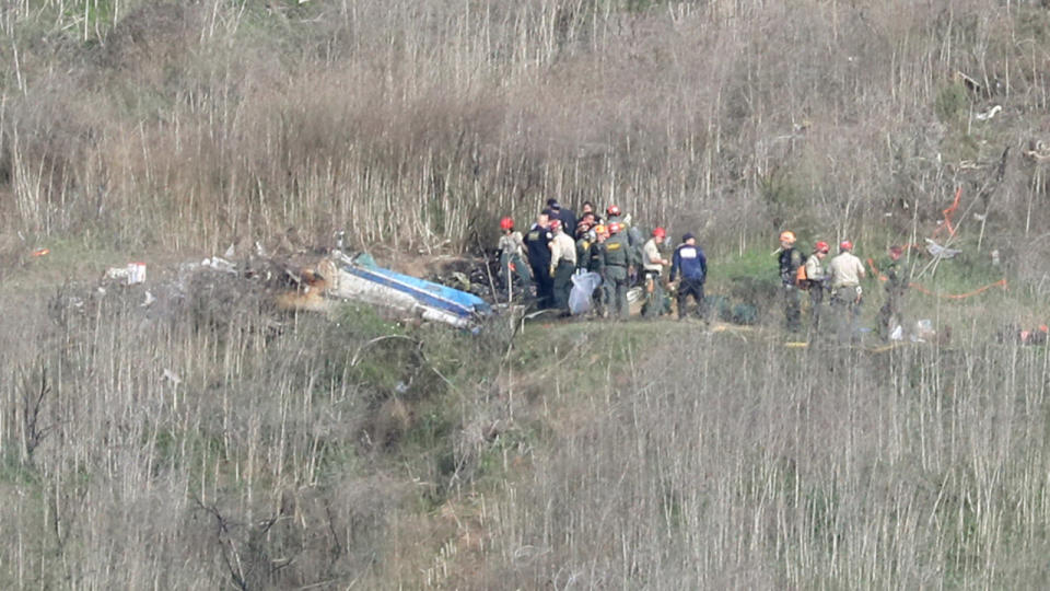 Emergency personnel, pictured here working at the helicopter crash site that claimed the life of Kobe Bryant.