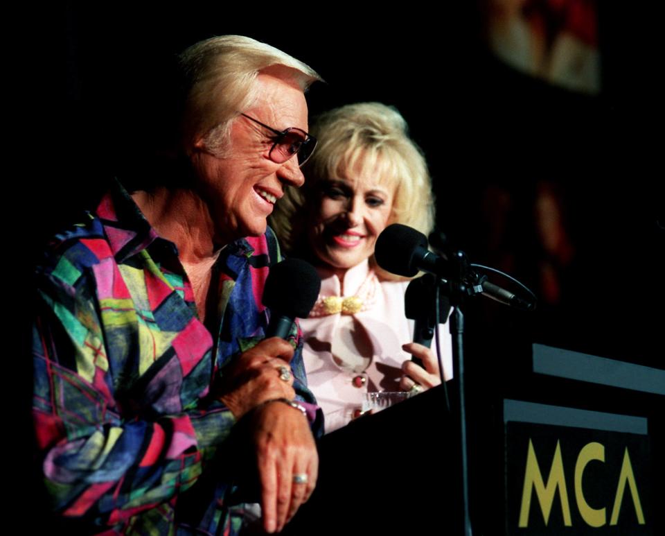 George Jones, left, and Tammy Wynette announce their new MCA album and companying tour together at Scene Three in Nashville April 18, 1995.