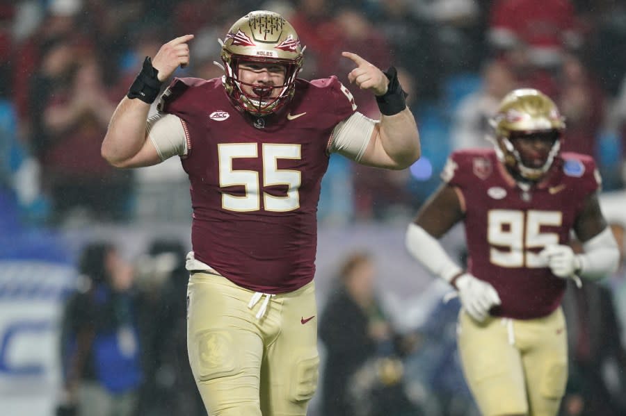 Florida State defensive lineman Braden Fiske reacts after a sack against Louisville during the second half of the Atlantic Coast Conference championship NCAA college football game Saturday, Dec. 2, 2023, in Charlotte, N.C. (AP Photo/Erik Verduzco)