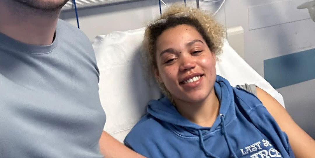 ruby barker smiling in hospital after bouldering accident