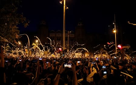 Separatists protest after a verdict in a trial over a banned Catalonia's independence referendum in Barcelona