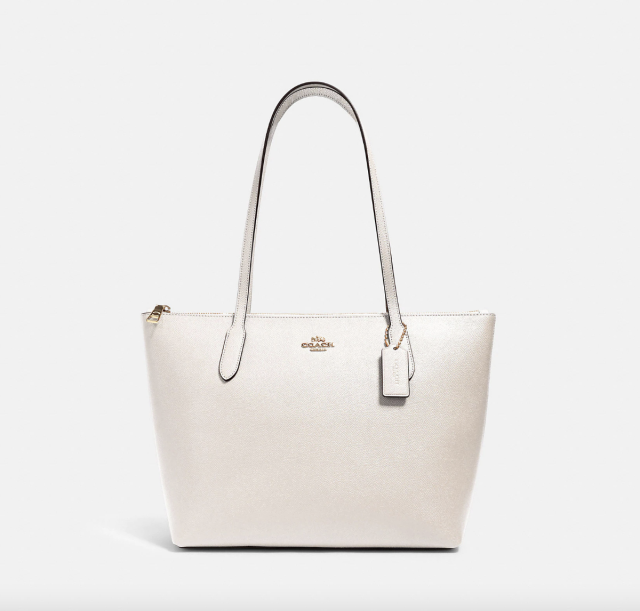 Coach Outlet Zip Top Tote in Gold/Chalk (Photo via Coach Outlet)