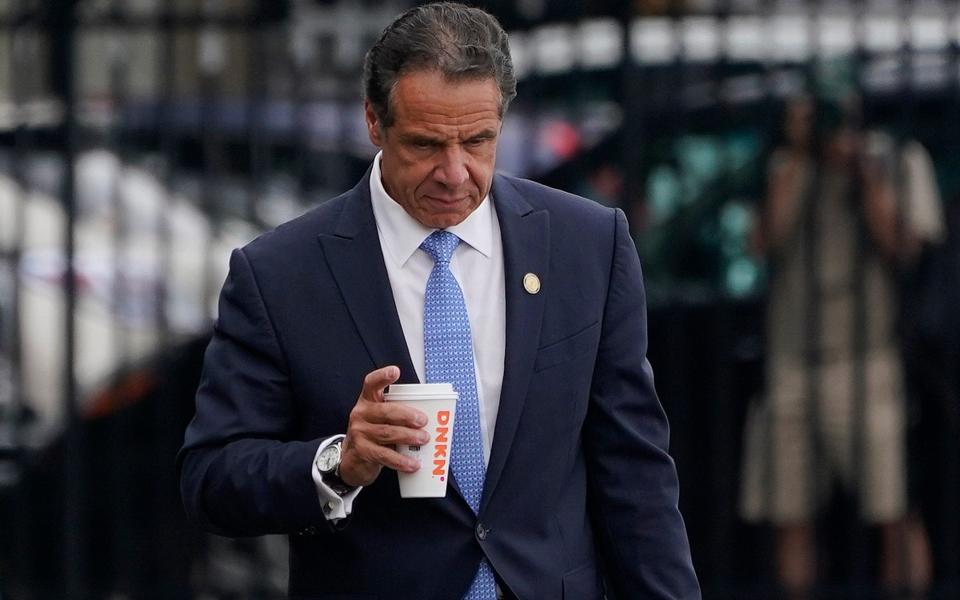 Andrew Cuomo prepares to board a helicopter after announcing his resignation, Tuesday, Aug. 10, 2021, in New York. - AP/Seth Wenig 