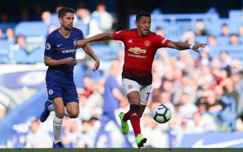 Alexis Sanchez in action against Chelsea   - Credit: Getty images