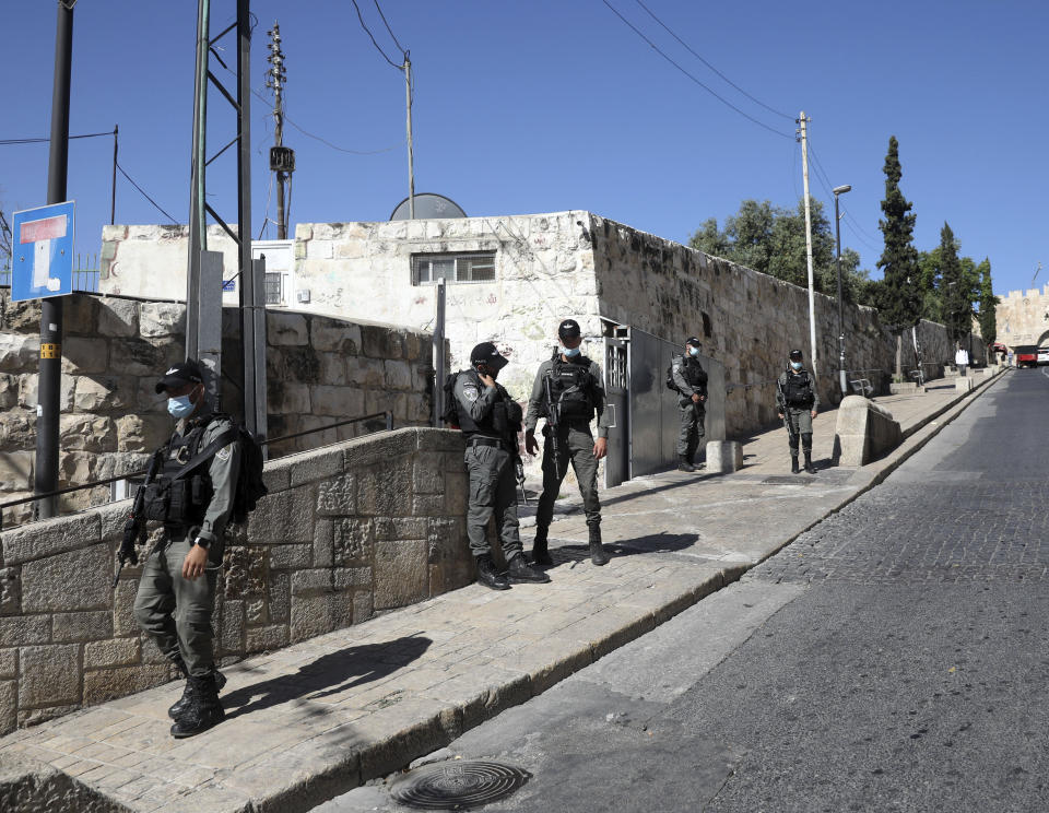 Israeli police officers secure the area of Lion's gate in Jerusalem's Old City, Saturday, May 30, 2020. Israeli police shot dead a Palestinian near Jerusalem's Old City who they had suspected was carrying a weapon but turned out to be unarmed. (AP Photo/Mahmoud Illean)