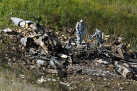 <p>A picture taken in the northern Israeli Kibbutz of Harduf on Feb. 10, 2018, shows the remains of an Israel F-16 that crashed after coming under fire by Syrian air defences during attacks against “Iranian targets” in the war-torn country. (Photo: Jack Guez/AFP/Getty Images) </p>