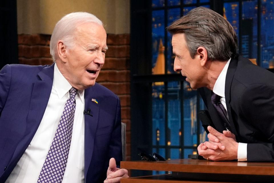 President Joe Biden talks with Seth Meyers during a taping of the "Late Night with Seth Meyers" Monday, Feb. 26, 2024, in New York. (AP Photo/Evan Vucci)