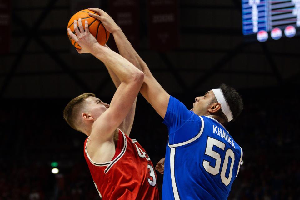 Utah Utes center Lawson Lovering (34) is defended by Brigham Young Cougars center Aly Khalifa (50) on the shot during a men’s basketball game at the Jon M. Huntsman Center in Salt Lake City on Saturday, Dec. 9, 2023. | Megan Nielsen, Deseret News